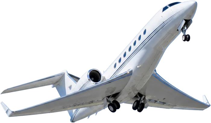White private jet climbing into a brilliant blue sky just after takeoff